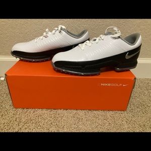 Brand new, never worn. Men’s Nike Air Zoom Attack golf shoes. Size 9.